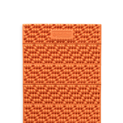 A NEMO Equipment Switchback™ Ultralight Sleeping Pad in orange, featuring a textured dimpled surface and Hypnoelastic zones, is displayed against a white background.